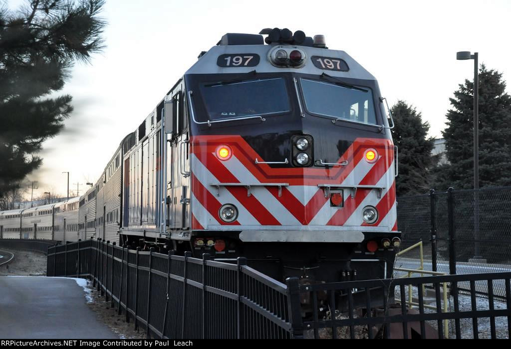 Inbound commuter prepares to shove out of its station stop